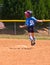 Young Girl Softball Player Running