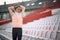 A young girl at the stadium preparing for a training. Sport, athletics, athletes