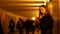 A young girl street musician plays the violin in an underpass tunnel