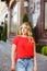 Young girl on a street walk. Street style portrait.