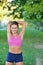 Young girl stretching outdoors. Jogging - workout preparations.