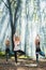 Young girl stretching yoga exercise in calm nature