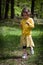 Young girl strolling in the woods