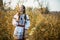 Young girl on the summer field in national Belarus clothes, fas