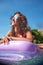 Young girl sunbathing on Adriatic waters