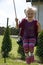 Young girl swinging at backyard