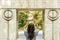 Young Girl Taking Photography Of The Gate of the Kiss