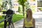 A young girl tells the news to the camera. Blogger. Journalist. News reporting