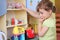 Young girl thinking on kitchen