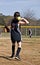 Young Girl Throwing Softball