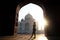 Young girl tourist looking to the Taj Mahal in Agra, India . concept of culture, tourism and religion