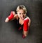 Young girl training boxing fist wrapped fighting woman concept