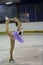 Young girl traning a figure skating