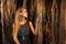 Young girl under the banyan tree