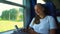 Young girl uses social media in intercity train close view