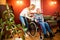 Young girl visit grandmother in wheelchair