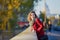 Young girl walking in Paris on a sunny fall day