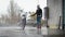 Young girl washes her bike at the car wash