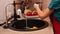 Young girl washing vegetables in a strainer