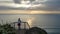 Young girl watching sunset rays