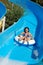 Young girl on water slide