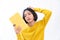 Young girl wear yellow sweater have bad mode with white background