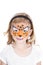 Young girl wearing cheetah carnival face paint