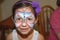 Young Girl Wearing Face Paint Butterfly Design