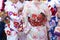 Young girl wearing Japanese kimono standing in front of Sensoji Temple in Tokyo, Japan. Kimono is a Japanese traditional garment.