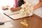 A young girl in a wedding dress signed an important document