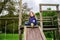 Young girl and wooden teeter board