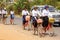 Young girls bicycle home from school