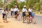 Young girls bicycle home from school