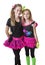 Young girls dressed in retro 80s clothing isolated on a white background