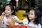 Young Girls Eating Fried Chicken