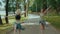 Young girls have fun and outdoors in slow motion. Womans in shorts runs in park