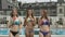 Young Girls Relaxing At The Pool