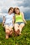 Young girls sitting in meadow