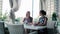 Young girls sitting in a restaurant.