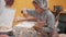 Young girls taking flour for preparation pastry on baking class in culinary school. School girl cooking donut on cooking