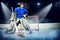 Young goalie in the spotlight of ice hockey arena