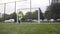 Young goalkeeper during his football training.