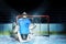 Young goaltender guards his net during hockey game