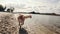 Young Golden Retriever Dog Running By Sandy Shore