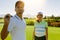 Young golfers at golf course together