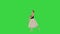 Young graceful ballerina in pointe shoes and white romantic tutu makes pas on a Green Screen, Chroma Key.