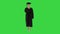 Young graduate woman sick and coughing while walking on a Green Screen, Chroma Key.