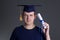 Young graduation man with diploma