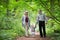 Young grandparents hiking with their baby grand daughter