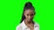 Young Grave African American Black Woman on a green background